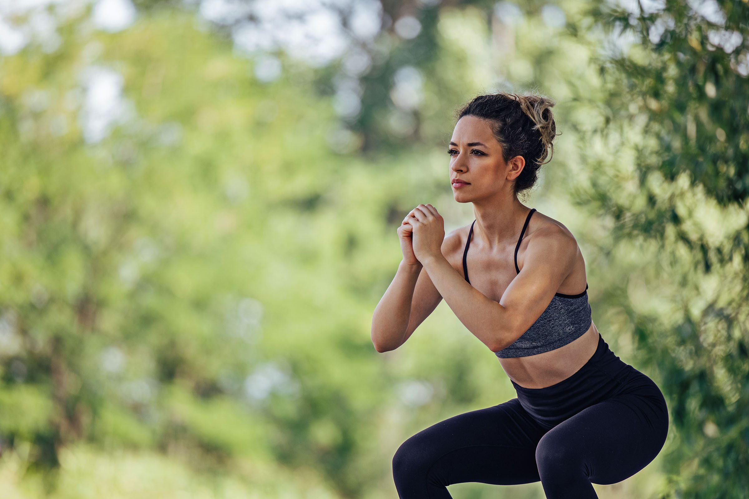 Young woman, relaxing during workout.