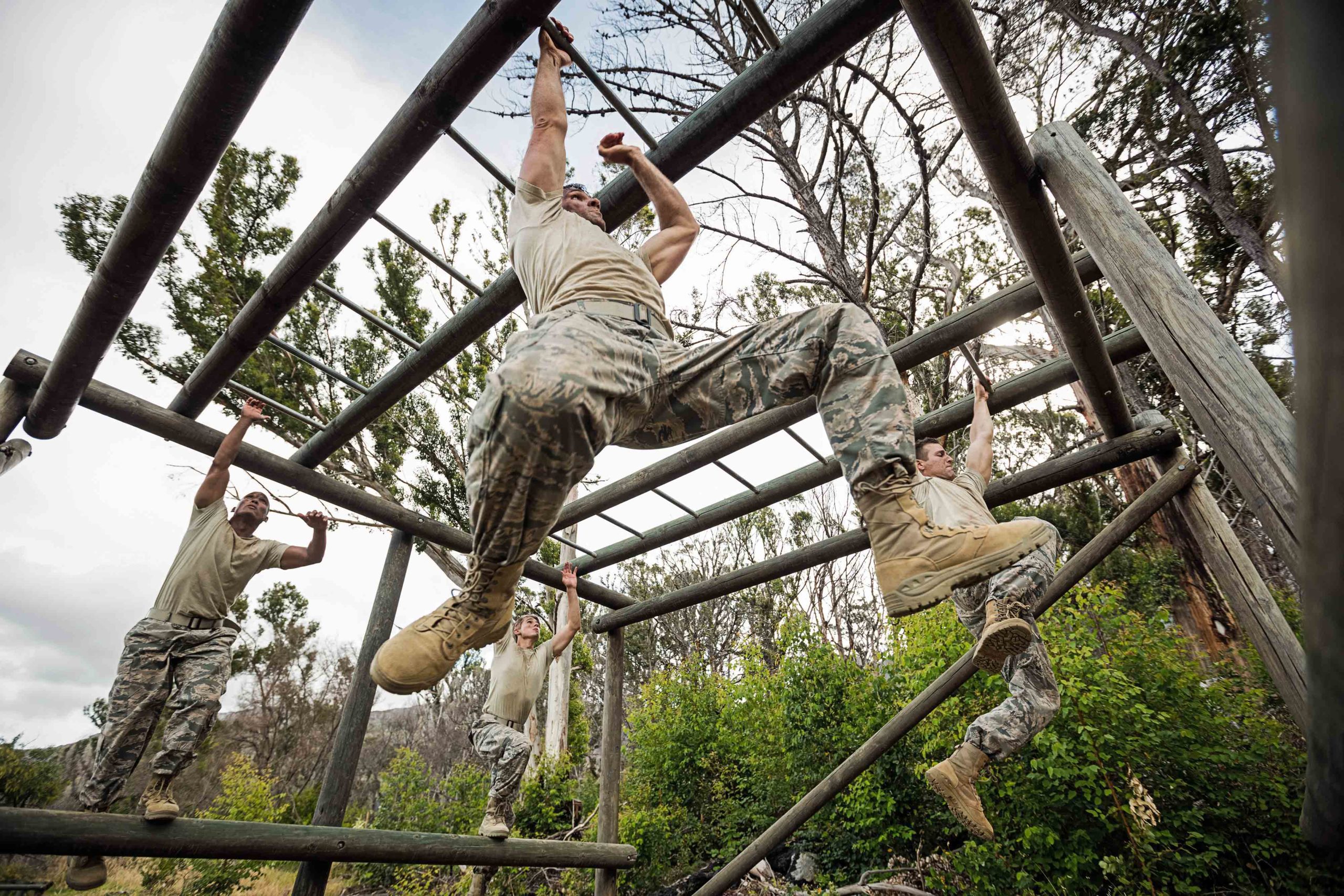 Strong, muscular man performing the kettlebell swing