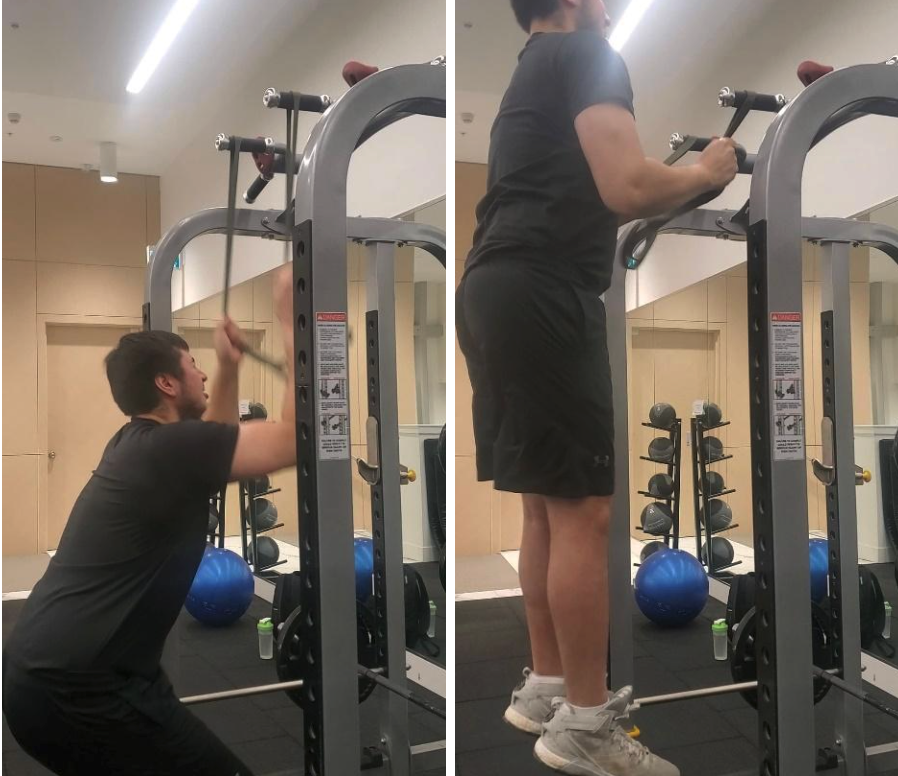 Man Doing Band-Assisted Vertical Jumps in Gym