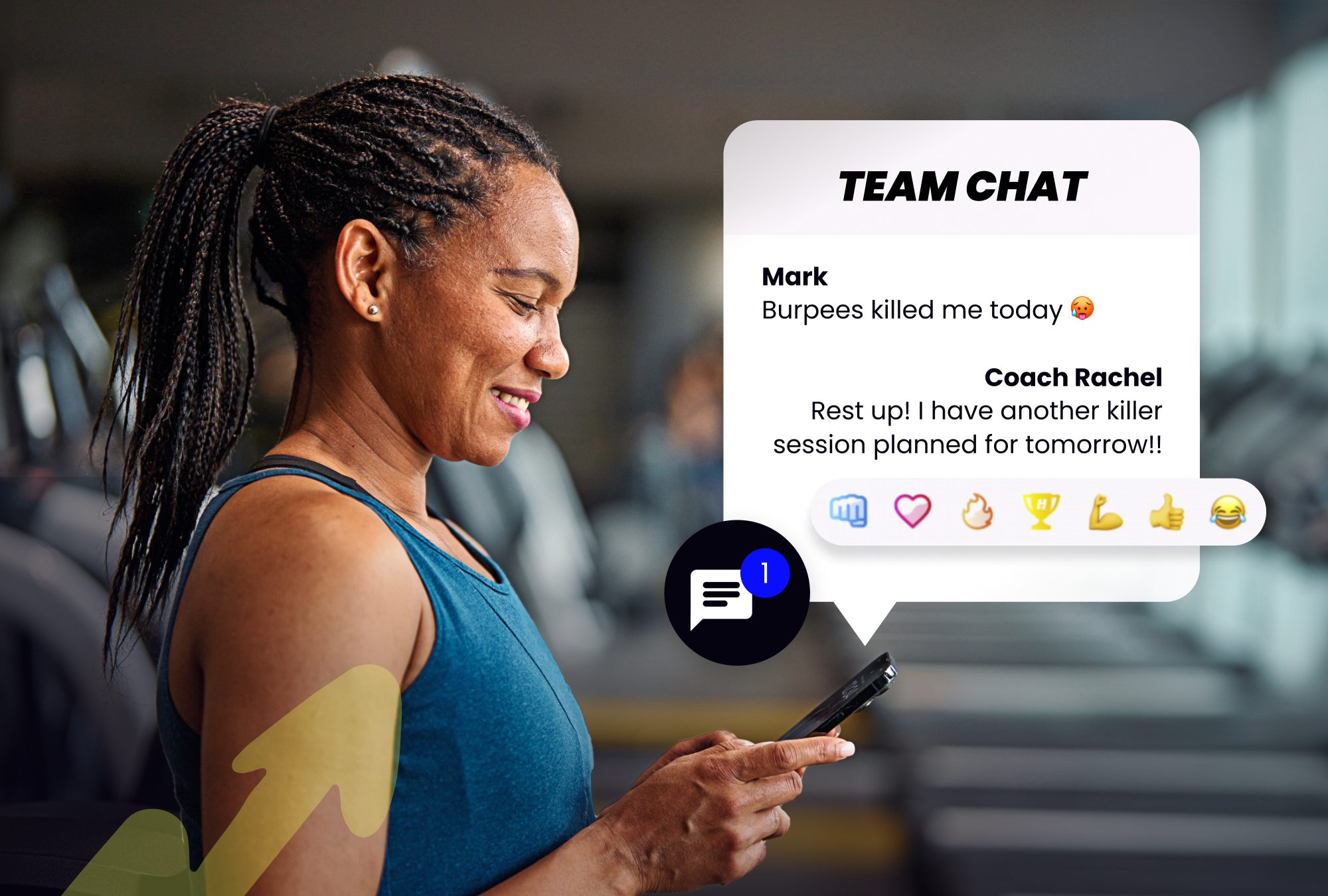 TrainHeroic_Chat_GymOwner_2000x1350 Female gym coach using a mobile app to message clients through the TrainHeroic team chat feature.